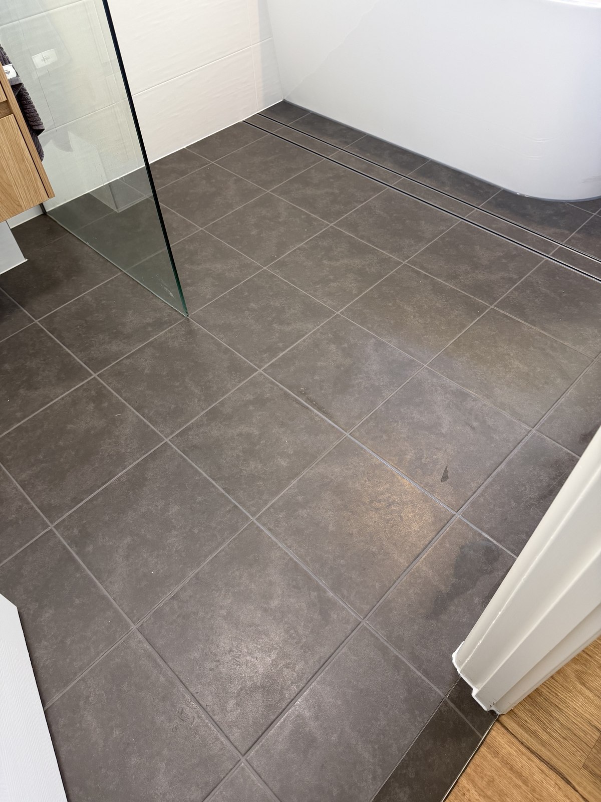 Epoxy grouted wet-area floor by GC Grout Masters